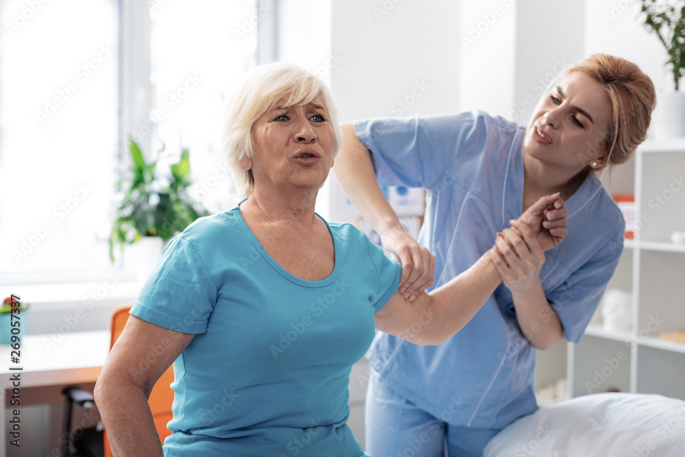 Nice aged woman having a painful massage Nice aged woman having a painful massage
