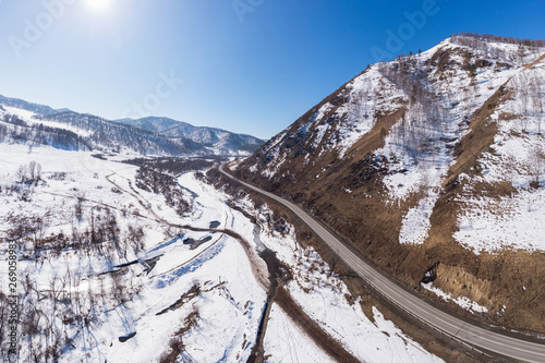 Aerial view of a road in wi...