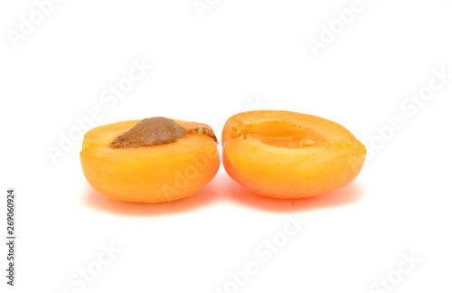Ripe apricot on white background close-up