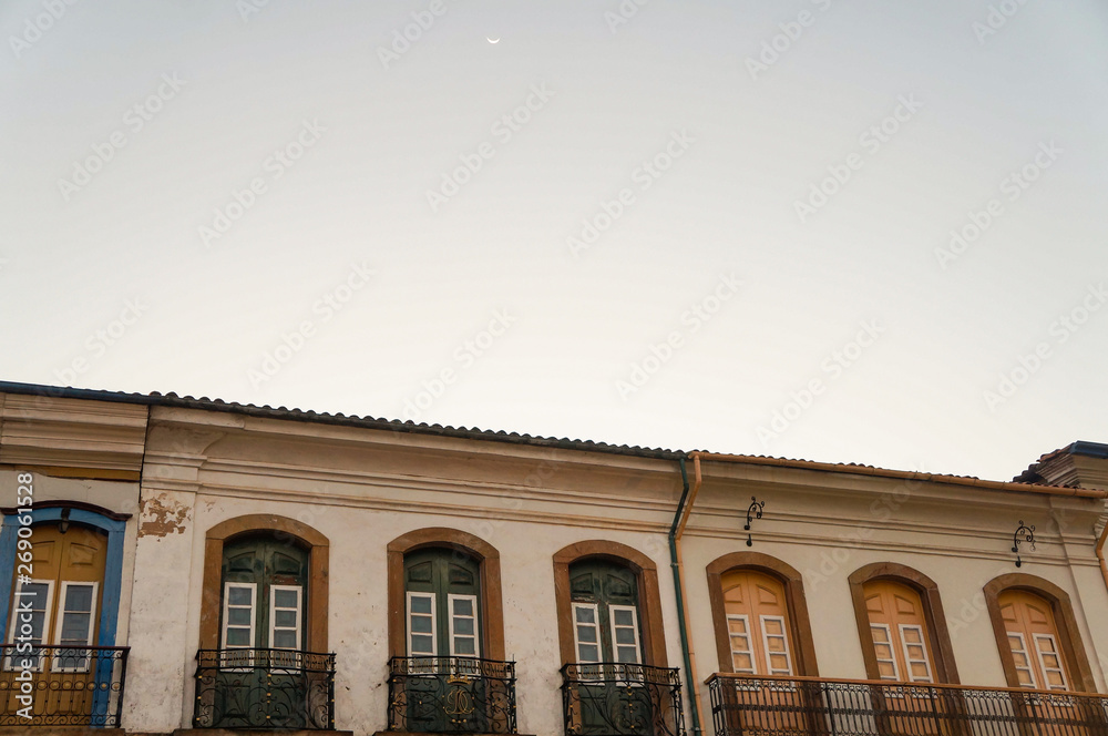 Historical facades with moon at Ouro Preto, Minas Gerais, Brazil                               