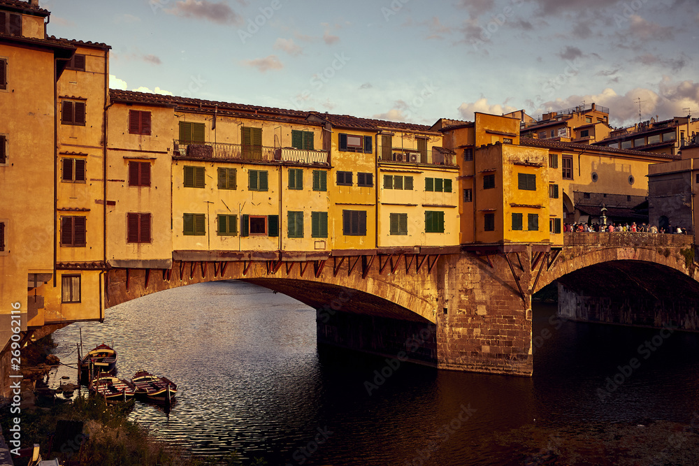 View of Gold Ponte Vecchio Bridge in Florence Arno river