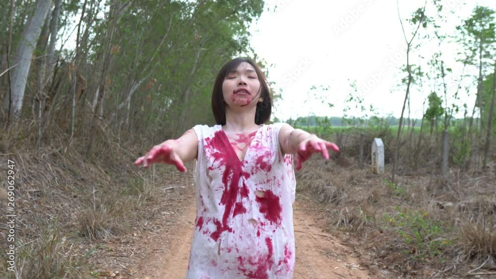 Portrait of asian woman make up ghost face,Horror scene,Scary background,Halloween poster,Thailand people,Lady has a axe in hand,Lovely zombie concept Portrait of asian woman make up ghost face,Horror scene,Scary background,Halloween poster,Thailand people,Lady has a axe in hand,Lovely zombie concept