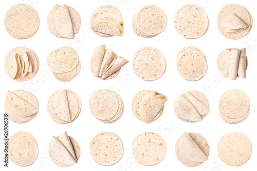 Set of delicious tortillas on white background, top view. Unleavened bread photo