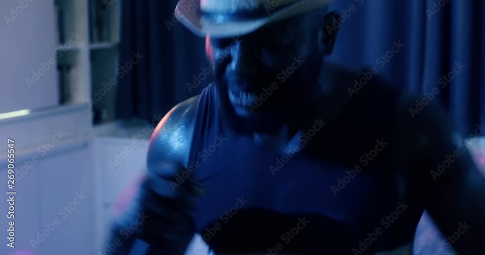 Black man singing with friends party in house party. Summer break party among friends. Mixed race asian, thai, chinese, African american. In living room party. Black man singing with friends party in house party. Summer break party among friends. Mixed race asian, thai, chinese, African american. In living room party.