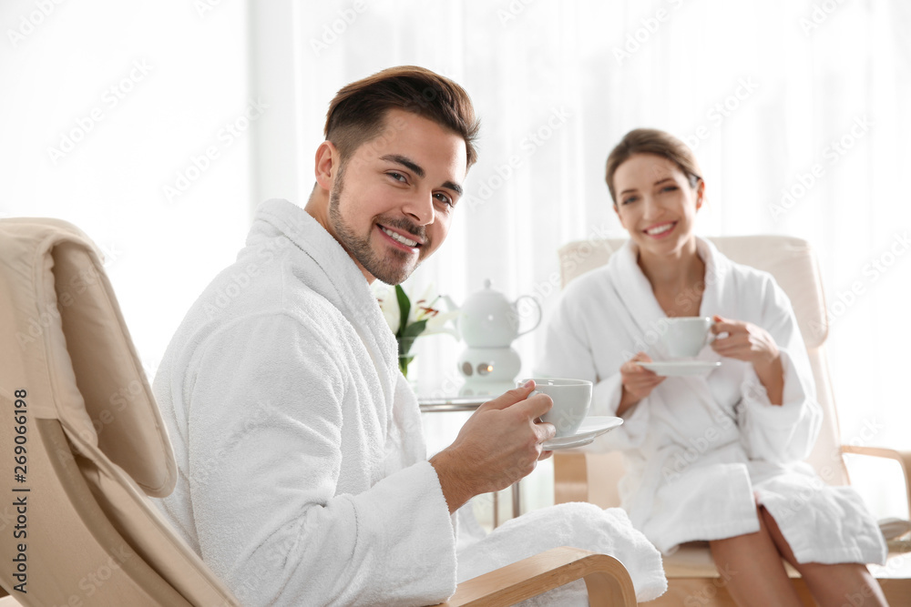 Romantic young couple with tea in spa salon Romantic young couple with tea in spa salon