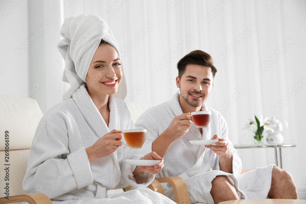 Romantic young couple with tea in spa salon Romantic young couple with tea in spa salon