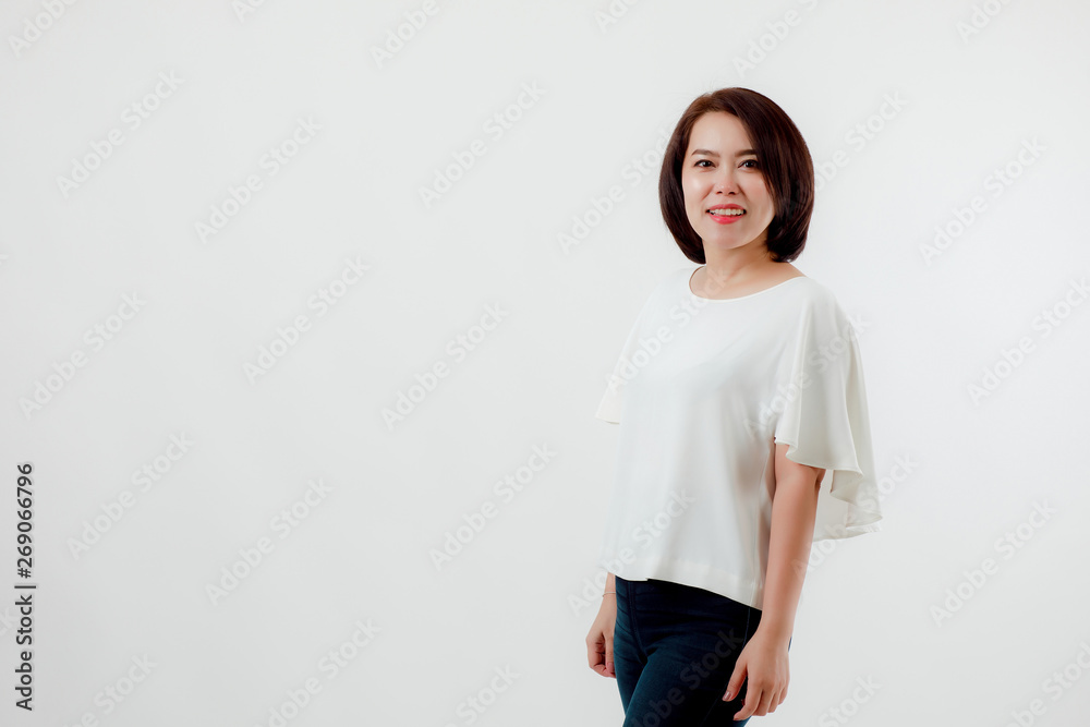 Asian beautiful woman Wearing a white shirt, standing smiling happily With a white background Asian beautiful woman Wearing a white shirt, standing smiling happily With a white background