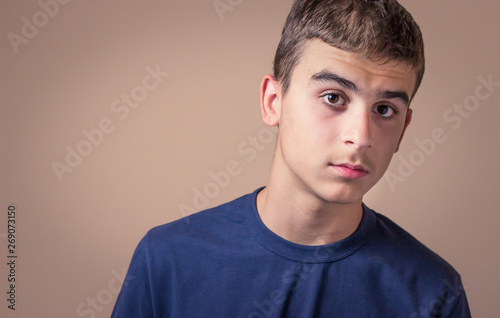 Closeup portrait confused young man. Human facial expression