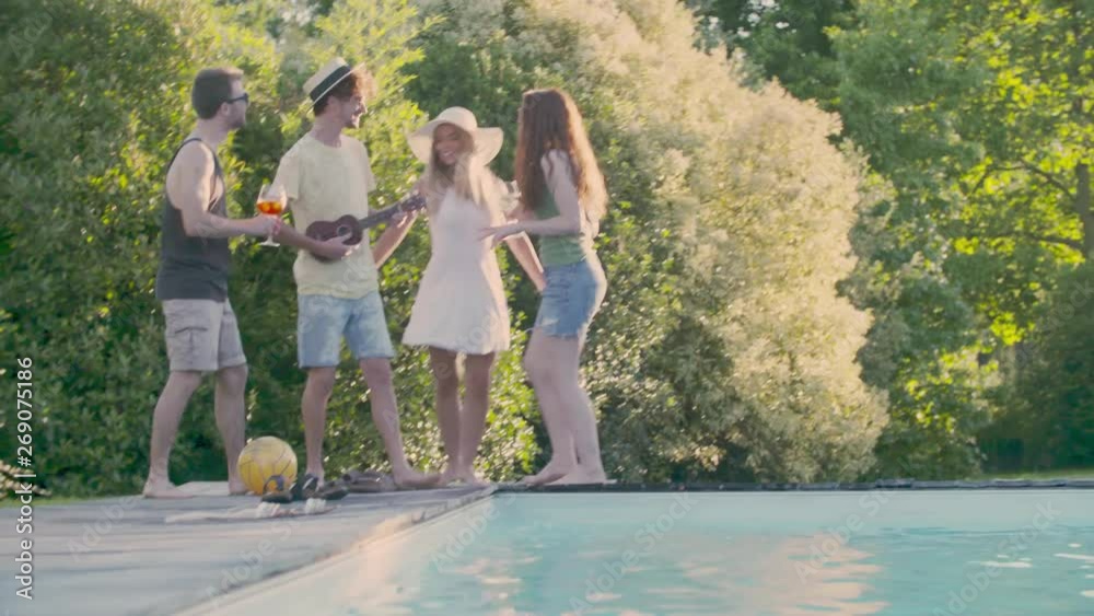 Group of friends enjoying summer time at swimming pool Group of friends enjoying summer time at swimming pool