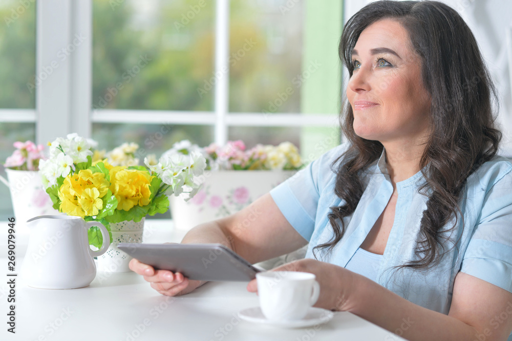 Portrait of beautiful woman using laptop at home Portrait of beautiful woman using laptop at home