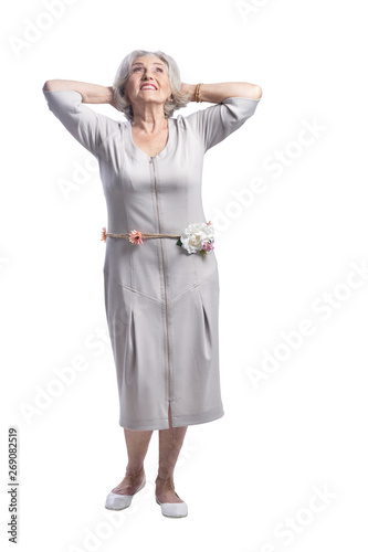 Beautiful senior woman, posing isolated against white background