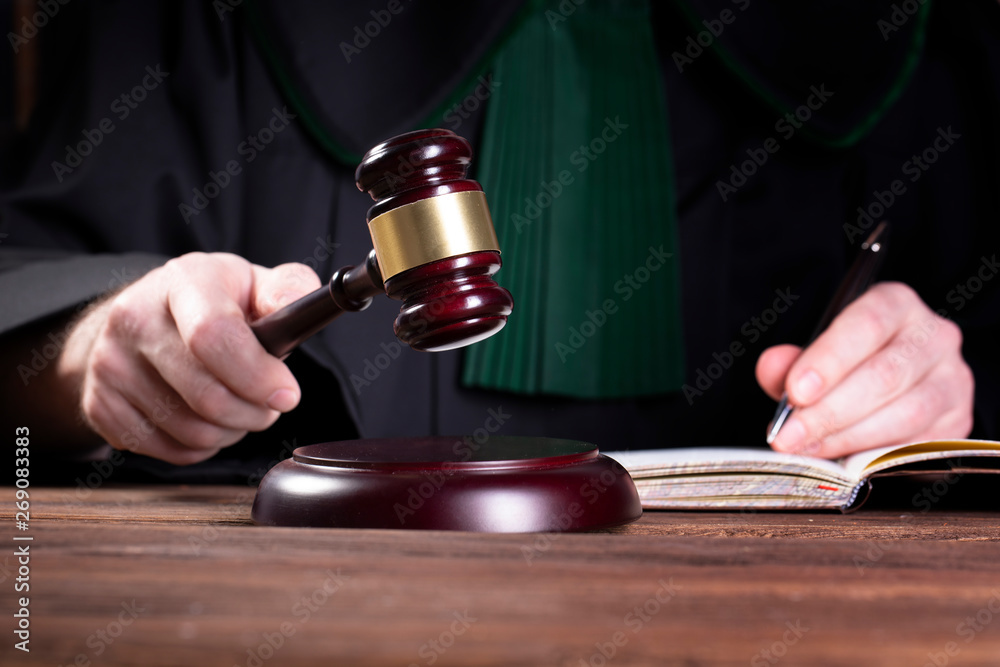 judge hits the gavel and pronunces final judgement judge hits the gavel and pronunces final judgement