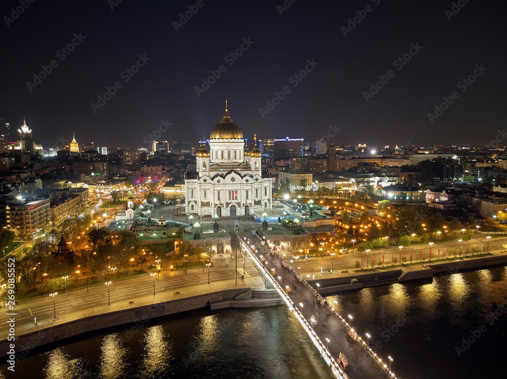 Cathedral of Christ the Savior in Moscow near river, Russia at night. Aerial drone view