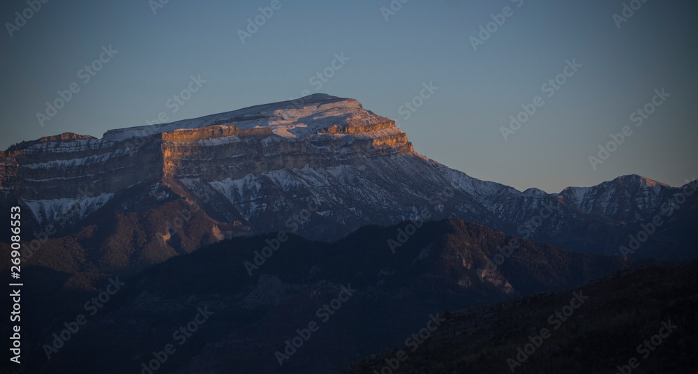Snowy caucasus mountain at sunset