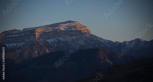 Snowy caucasus mountain at sunset