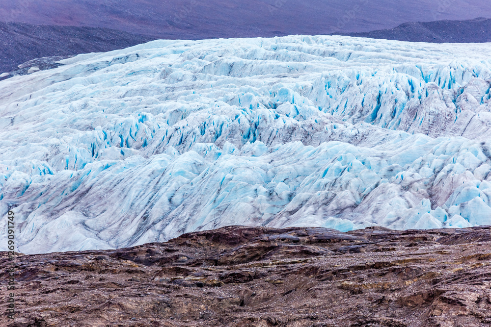 At the edge of the glacier Nordenskiöldbreen near Pyramiden, on the coast of Billefjord, Svalbard. Norway At the edge of the glacier Nordenskiöldbreen near Pyramiden, on the coast of Billefjord, Svalbard. Norway