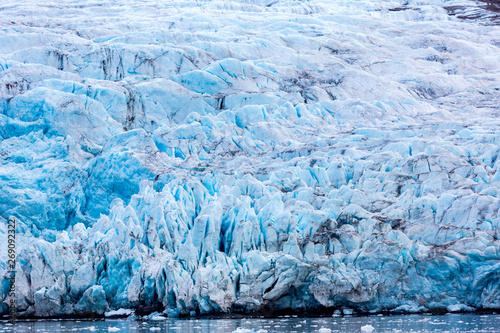 At the edge of the glacier Nordenskiöldbreen near Pyramiden, on the coast of Billefjord, Svalbard. Norway