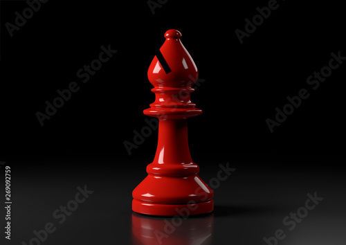 Foto Red bishop chess, standing against black background