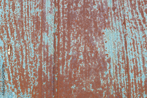 A rusty, corrosive background or texture.