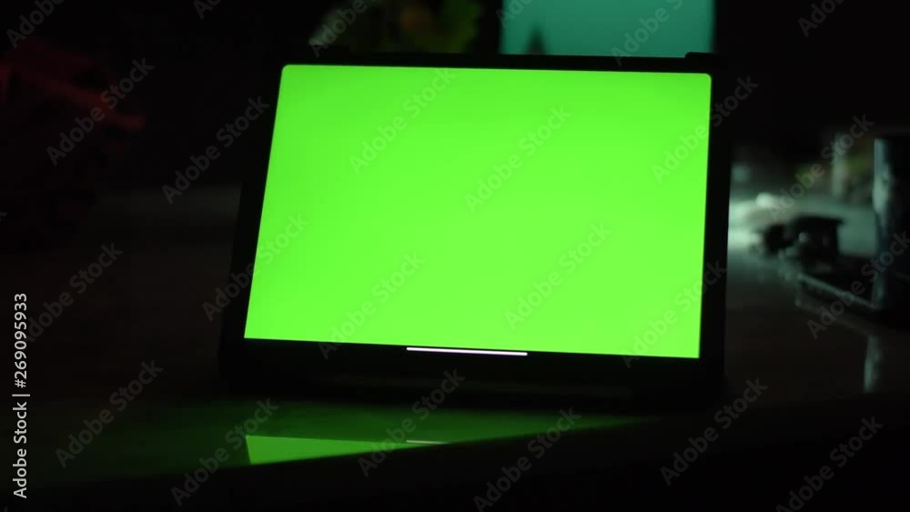 Dolly shot of Tablet computer with green screen chroma key. Dolly shot of Tablet computer with green screen chroma key.