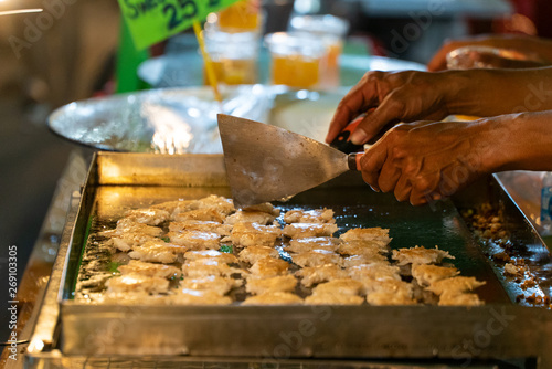 Kanom Krok, a popular Thai dessert street food on Phuket Island in Thailand, Asia 