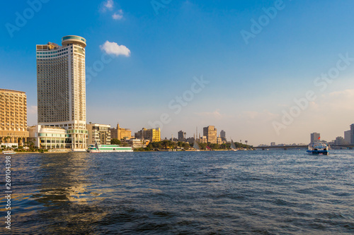Cairo  Egypt - April 19  2019  Cairo city with urban skyline skyscrapers and sailing boats