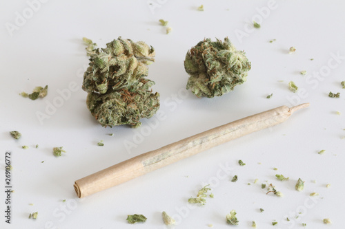 Close-up of Marijuana Buds and Joint in a White Background. Legal Weed.