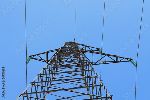 Metal mast power line. Bottom-up view. Close-up. Background.