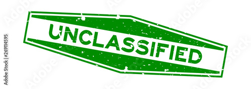Grunge green unclassified word hexagon rubber seal stamp on white background
