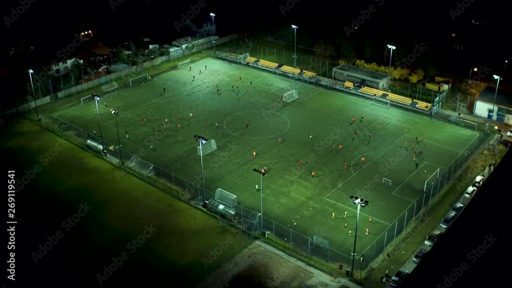 Drone footage of soccer team training.