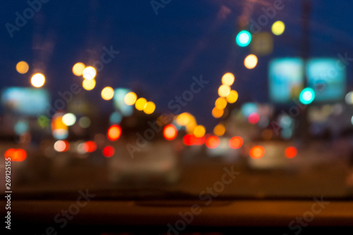 defocused city night street view from car front window © MasterSergeant