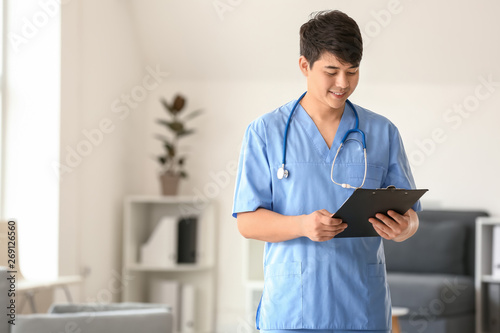 Male medical assistant with...