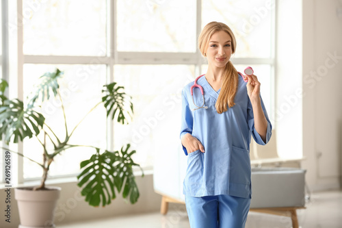 Female medical assistant in...