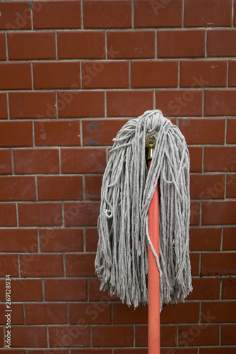 A mop on the wall