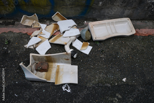 The toilet is broken on the street