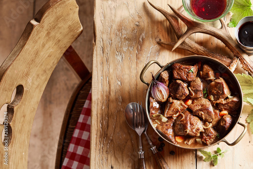 Wild venison hotpot of goulash with deer antlers