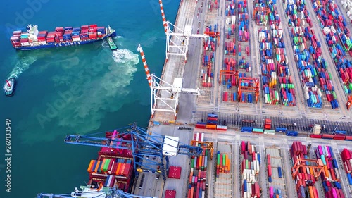 4K, Time lapse  industrial port with containers from top view or aerial view. It is an import and export cargo port where is a part of shipping dock and export products worldwide