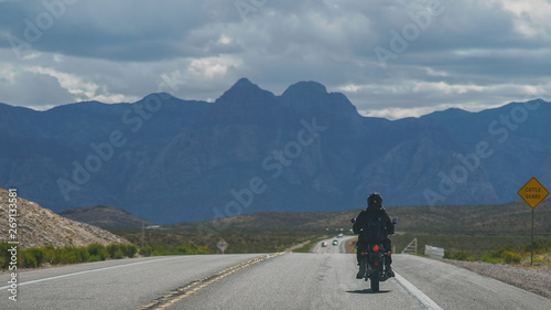Motorcycle Through the Mountain Valley