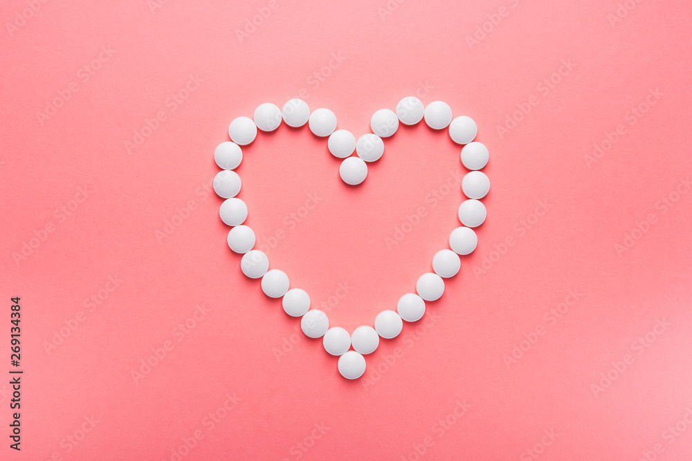 White heart made from tablets and pills