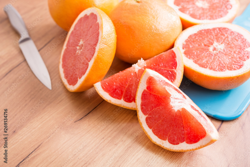 Closeup of sliced juicy grapefruit pieces Closeup of sliced juicy grapefruit pieces
