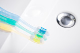 Closeup of toothbrush on a sink white