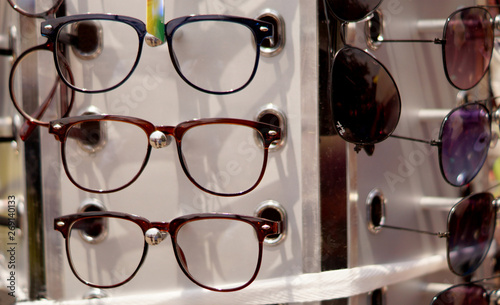 View of eye wear or glasses in display by Indian street vendor in outdoors,in the market
