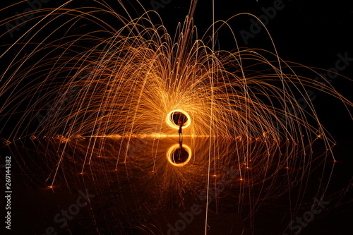 Steel wool spinning fireworks in the night sky