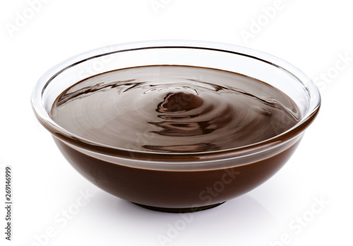 Bowl with melted chocolate isolated on white background.