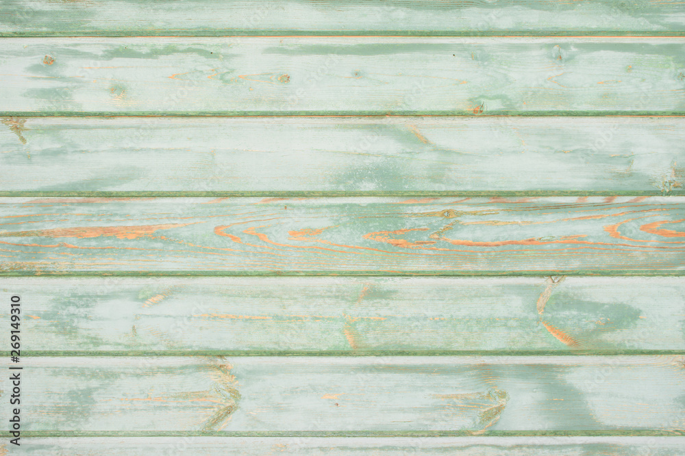 Fototapeta premium Green wooden background.