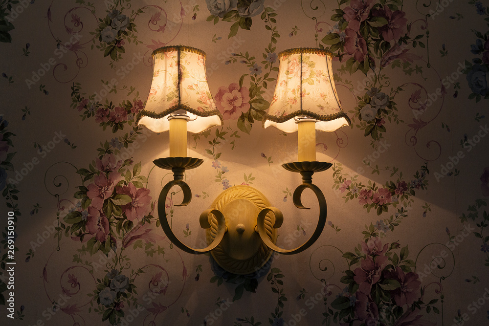 Beautiful vintage wall lamp in the bedroom. Interiors