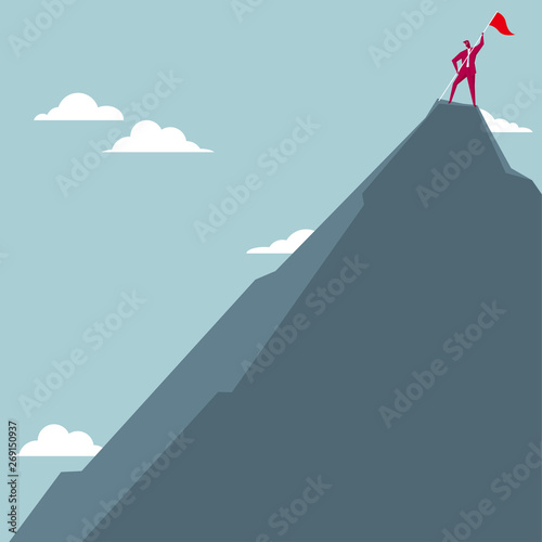 The businessman occupied the top of the mountain. Isolated on blue background.