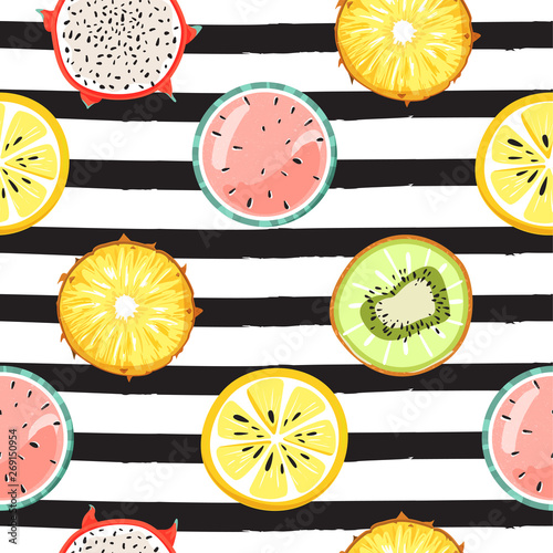 Seamless tropical pattern with slice of watermelon, dragon fruit, pineapple, kiwi and lemon. Fashion striped background. Texture for textile, wrapping paper, packaging etc. Vector illustration.