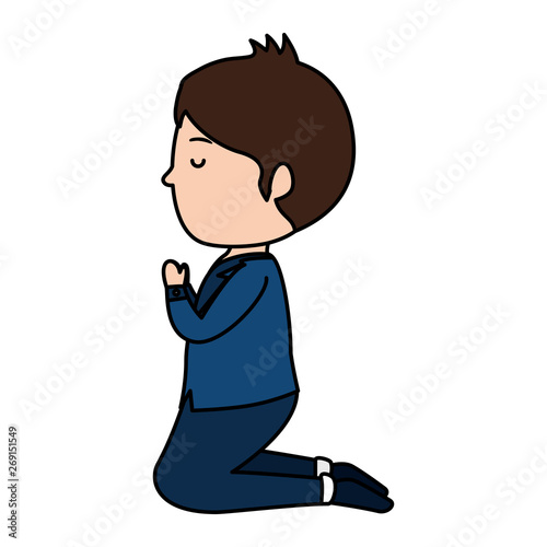 little boy kneeling first communion