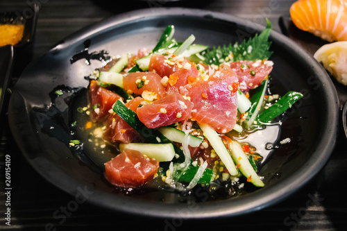 Spicy salad with raw tuna meat.